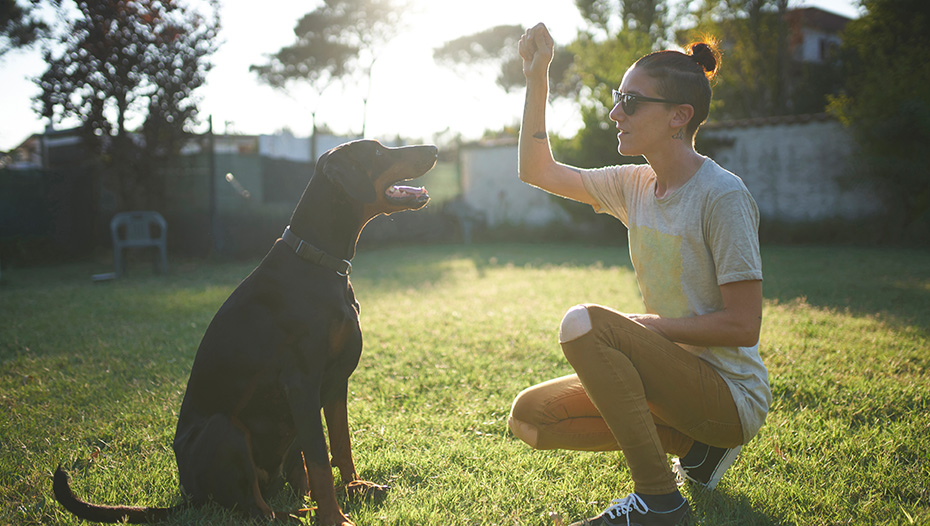 Woman training dog